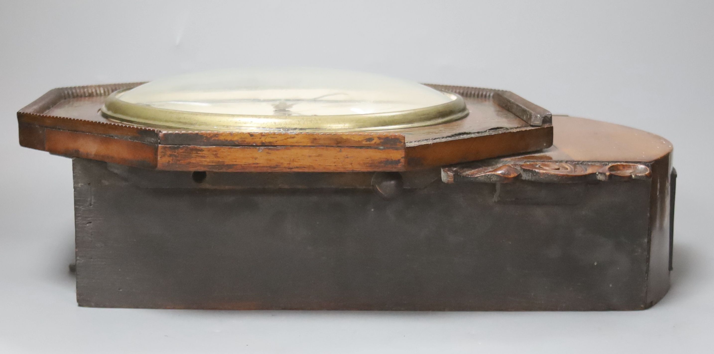 A 19th century rosewood and cut brass cased wall clock, with a 9